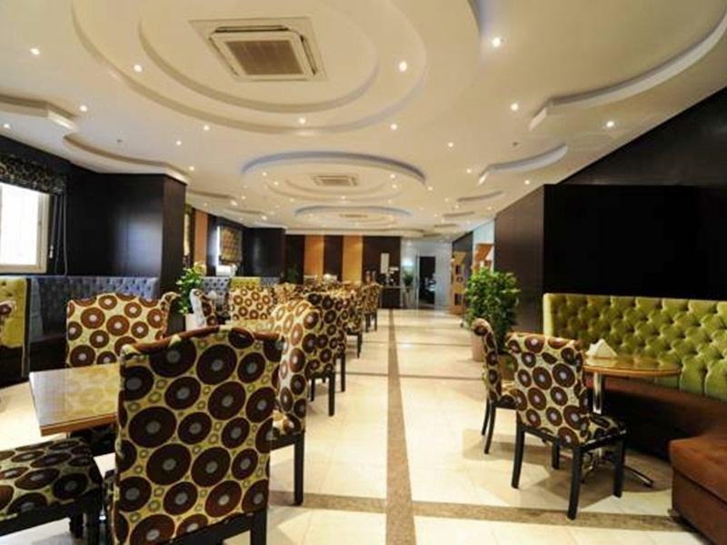 Rose Garden Hotel Riade Restaurante foto