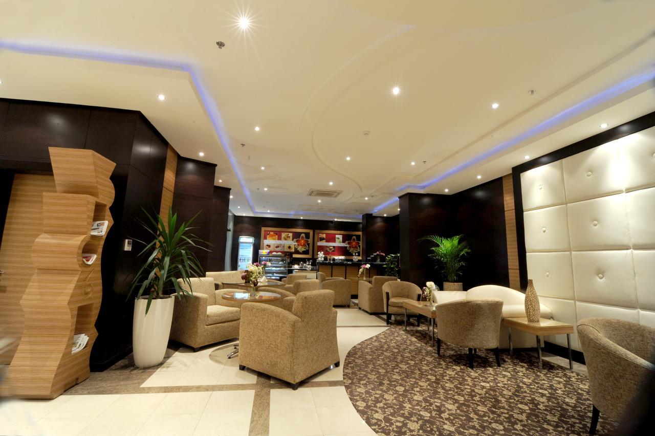 Rose Garden Hotel Riade Restaurante foto